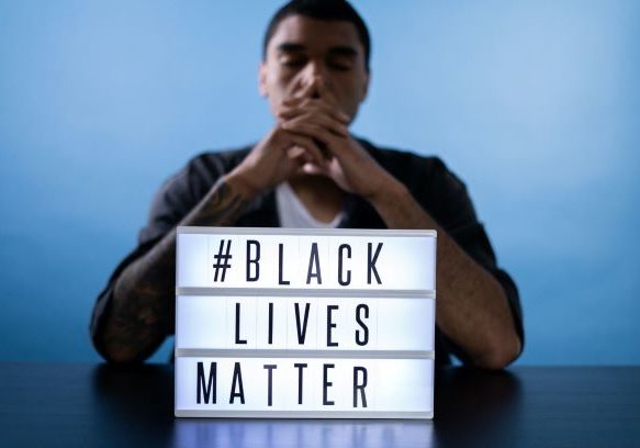 man-behind-a-black-lives-matter-sign-4676367_Small